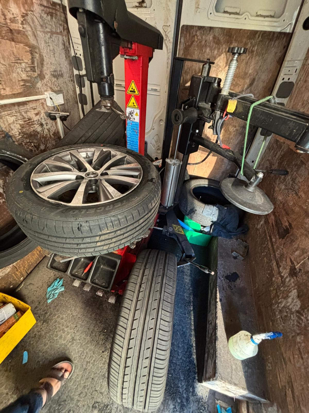 Tyre fitting machine inside mobile van at Birmingham Tyres World